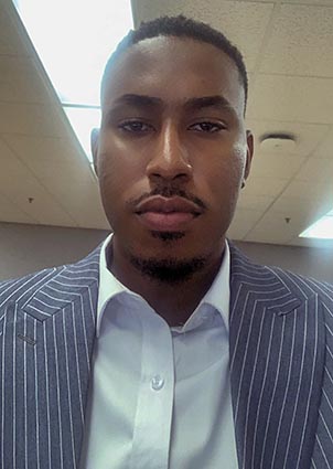 photo of S&T graduate student Frederick Attoh in a hallway on campus